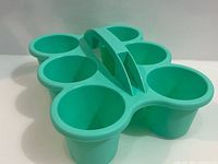 Top view showing six cup compartments and handle