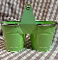 Front view of lime green double planter caddy