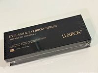 Front of sealed Luxros Eyelash & Eyebrow Serum box