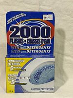Front of sealed 2000 Flushes Blue Plus Detergents toilet bowl cleaner package