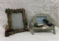Both decorative garden-themed photo frames side by side
