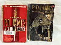 Front covers of both paperbacks showing titles and wear