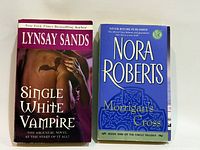 Front covers of both paperback novels