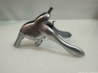 Lever corkscrew side view, handles closed