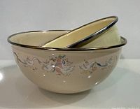 both nesting bowls stacked to show size difference and pattern