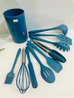 All utensils and holder laid out