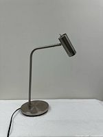 Full view of lamp powered off, showing overall design and cord