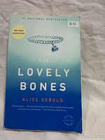 Front cover showing title, author, bestseller and motion picture badges