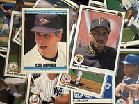 Pile of assorted baseball cards with key players visible