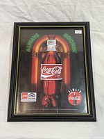 Front view of framed poster showing full design and frame