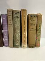 All six book spines lined up for titles and publishers