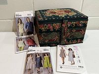 Overall view of closed basket with five pattern envelopes