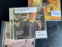 Front view showing Joshua Bell CD in foreground, partial views of other two CDs