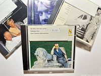 Front covers of four CDs showing titles and performers