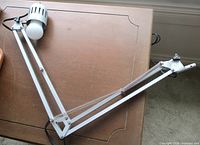 Lamp fully extended on tabletop