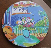 Top view of colorful round trivet showing Sydney Opera House artwork
