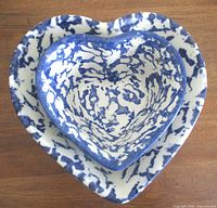 Overhead view of both heart-shaped spongeware bowls nested