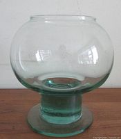 Front view of aqua art glass pedestal fish bowl vase