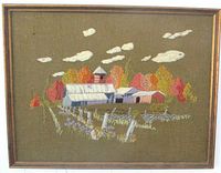 Front view of framed crewel artwork