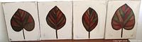 All four leaf paintings side by side showing size and imagery