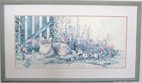 Full view of framed cat print with mat and frame