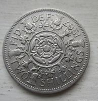 Reverse side showing crowned Tudor rose design and 1967 date