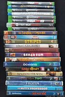 Full stack showing Xbox green cases on top and DVD cases below