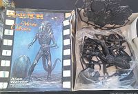 Full box with contents showing sprues and base