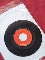 A-side Helter Skelter label on Capitol 7" record