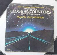 Front of picture sleeve showing title and artwork