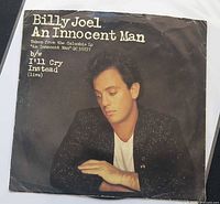 Front of picture sleeve with Billy Joel image and track information