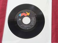 A-side label showing title, artist, speed and label