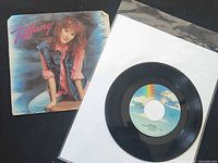 Vinyl single with picture sleeve and record