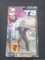 Front view of sealed T-800 figure in blister card