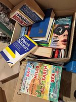 Box showing assortment of books