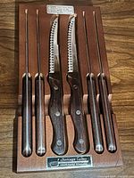 Full set in wooden box showing all knives and skewers