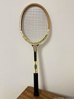 Full view of wooden Slazenger Wimbledon racquet front side