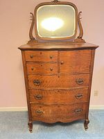 Front view of highboy dresser with attached mirror