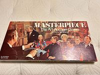 Front of Masterpiece: The Art Auction Game box