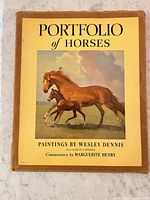 Front cover showing title, illustration, overall wear