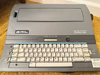 Full view of Smith Corona DeVille 265 showing housing and keyboard