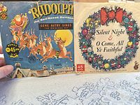 Front sleeves of both singles: Rudolph the Red-Nosed Reindeer and Silent Night / O Come, All Ye Faithful