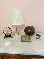Group shot of all five decor items on marble surface