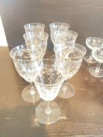 Seven etched floral wine goblets
