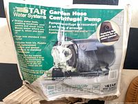 Retail carton showing STAR Water Systems Garden Hose Centrifugal Pump graphics and specifications