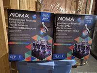Two NOMA Kaleidoscope Projector String Lights boxes stacked