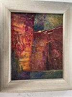 Front view of framed abstract cold wax and oil painting