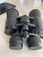 Front view of Celestron Up Close G2 binoculars showing objective lenses and focus mechanism