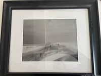 Front view of framed photograph showing image, mat, and frame