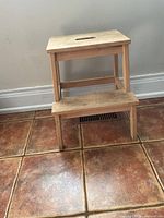 front view of two-step wooden stool
